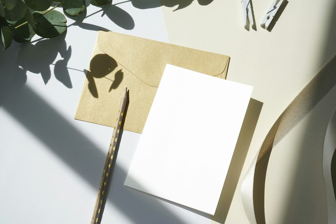Documents and pen on a desk being reviewed