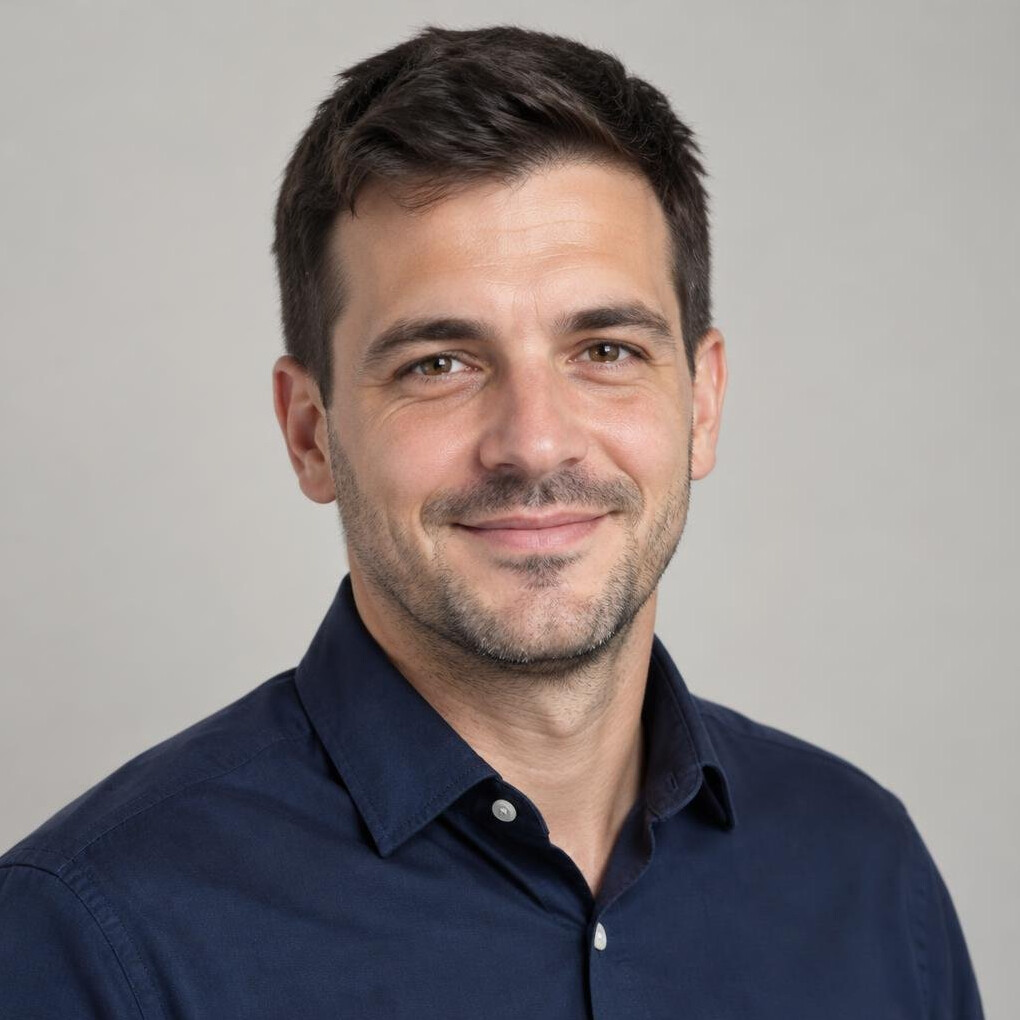 Smiling man in his thirties with short hair