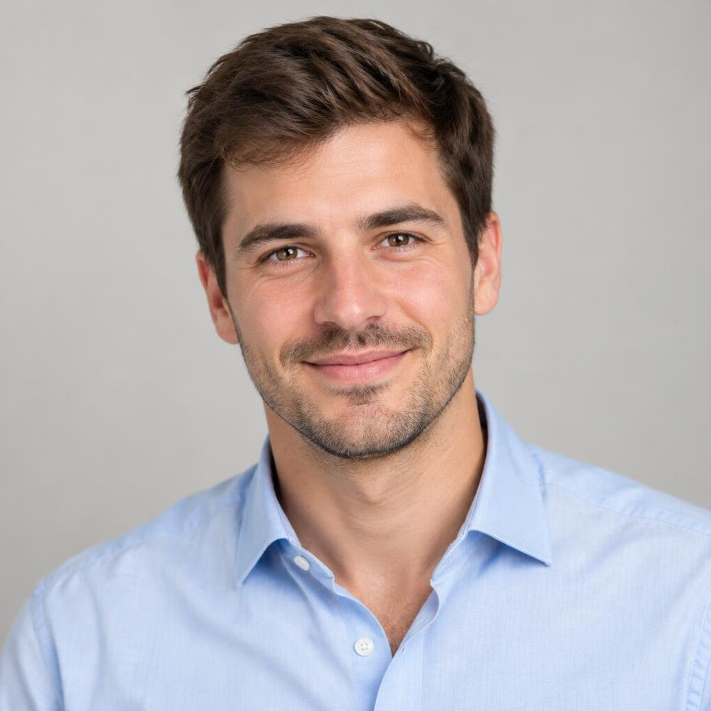 Young man in a shirt looking at the camera